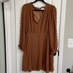 Elle Rae Boutique. Size M. Color is a light coffee brown with brown raised dots